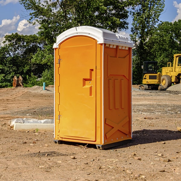 what is the cost difference between standard and deluxe portable restroom rentals in Atchison County Kansas